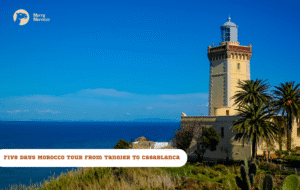 Merry Morocco tour card for Five Days Morocco Tour from Tangier to Casablanca featuring a lighthouse on a promontory with sea and trees
