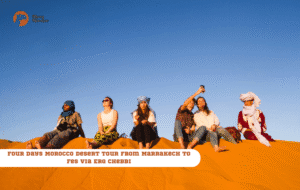 Merry Morocco tour card for Four Days Morocco Desert Tour from Marrakech to Fes via Erg Chebbi showing tourists on red Sahara dunes